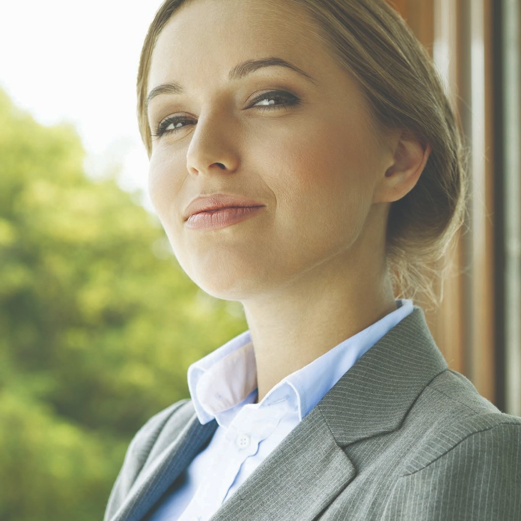 Business women in formal attire, representing reliability and financial protection through trade credit insurance